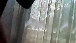 short haired cam girl teases ass with anal beads