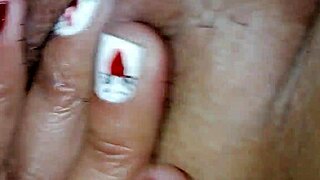 Mature woman pleasures herself in private session