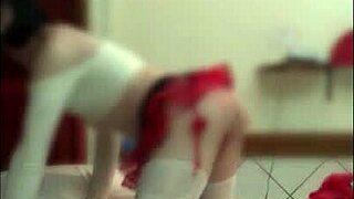 Crossdressing schoolgirl fantasy ladyboy prostitute in sexy uniform cosplay