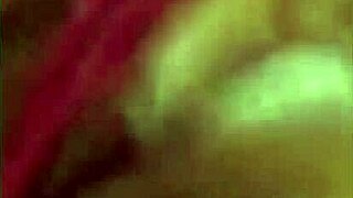 latina beauty masturbates wet pussy with dildo on bed