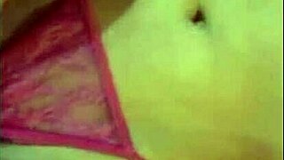 latina beauty masturbates wet pussy with dildo on bed