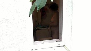 sexy wife showers naked outdoors as neighbor watches her wet pussy and big ass