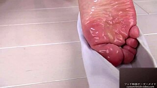 i lotion her soft soles and she moans erotically