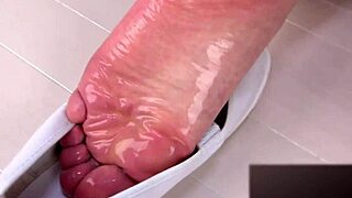 i lotion her soft soles and she moans erotically