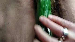 oma gets playful with cucumber on her hairy spot