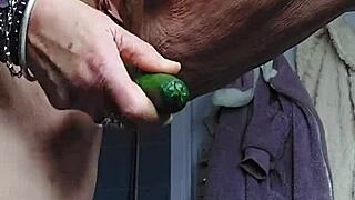 oma gets playful with cucumber on her hairy spot
