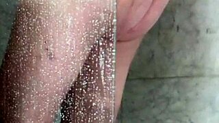 Wife caught masturbating with shower head to orgasm again?