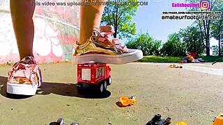 giantess kati crushes toy cars tramples huge plastic with sneakers