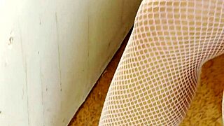 Busty Fishnet Slut Handjobs Huge Gloryhole Cock with Cum on Fake Tits Spitting
