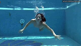 jessica lincoln looks great in her pink bikini floating around the pool