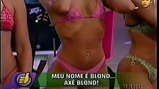 Blonde Brazilian TV babe strips as team rips clothes super positive