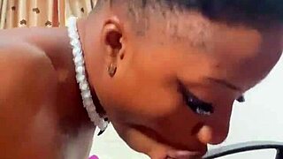 naija babe candy kneels to suck that massive black cock deep