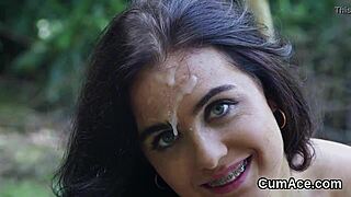 this hot babe kneels for a blowbang swallowing cum loads and swapping jizz on her face pov