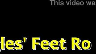 Giggles' Bare Feet Accumulate Sand During Beach Backstage Session