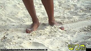 Giggles' Bare Feet Accumulate Sand During Beach Backstage Session
