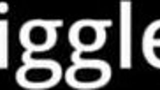 Giggles' Bare Feet Accumulate Sand During Beach Backstage Session