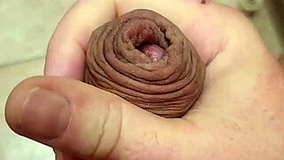 he strokes himself to climax alone