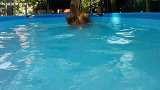 melissa the tattooed milf with brown eyes swims naked in her pool