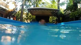 melissa the tattooed milf with brown eyes swims naked in her pool