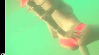 wanna see this horny slut rub her pussy on arraial do cabo beach?