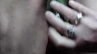 Granny Oma rams cucumber into hairy wet pussy