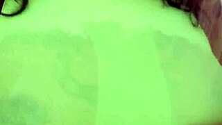 Masked ebony milf spreads big tattooed ass wide