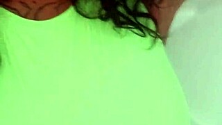 Masked ebony milf spreads big tattooed ass wide