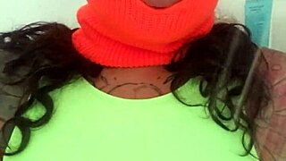 Masked ebony milf spreads big tattooed ass wide