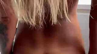 Monika Fox undresses pink bodysuit in kitchen