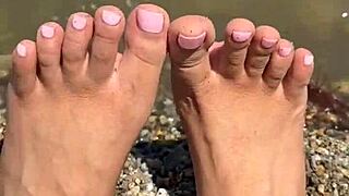 asian beauty shows off beach soles and feet closeup