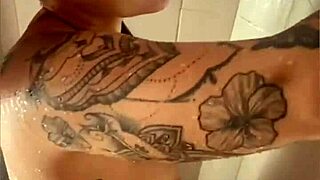 Curvy babe flashes her big ass while showering in the bath