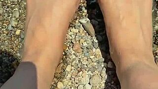 asian beauty shows off beach soles and feet closeup