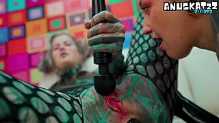 what happens when inked goth girls fist latex asses to squirt?