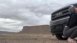 Amateur couple sneaks a public blowjob on big cock right by the road outside their hotel for watchers.