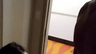 Amateur couple sneaks a public blowjob on big cock right by the road outside their hotel for watchers.