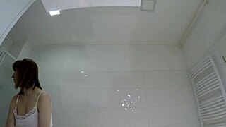 hot redhead coed lifts skirt bares pussy ass bathroom