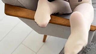 hey, wanna see this cute college nerd playing with her nylon-covered feet?