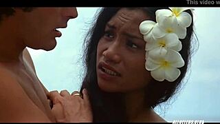 In 1981 Manuia slices pacific banana topless with big tits heaving retro style