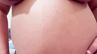 pregnant arab stepmom teases on webcam stripping clothes to reveal hairy pussy