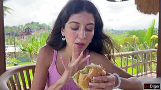 cute brunette teen eats burger cum-covered face flashing tits public cafe