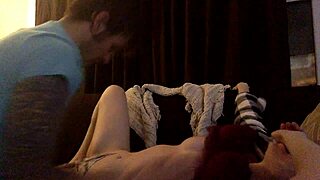 couple on sofa fingers and licks in lingerie play