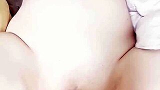 Korean babe rides fucking machine dildo till she squirts everywhere