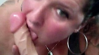 Tattooed Brunette Toys Pussy with Huge Dildo