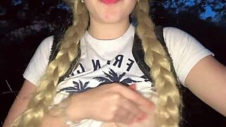 A lost college girl gropes her pink pussy and natural tits deep in the jungle.