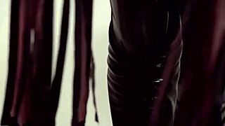 yo, check this ebony shemale rocking latex while handling that big black cock fetish style