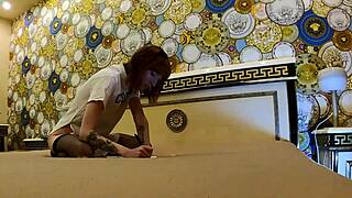 i spot this skinny redhead's tight shaved pussy peeking out braless on the bed in stockings