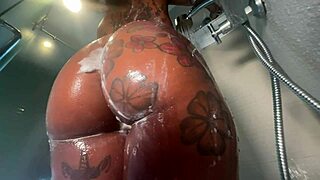 Her wet ebony ass twerks slowly in shower