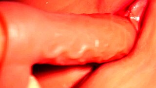 i slide fake penis deep into her big shaved pussy close up