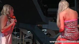 two blonde babes strip undress outdoors publicly on stage, clothes ripped in amazing reality sex show