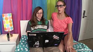 Nerd teen with glasses jerks off her friend's throbbing monster cock handjob style